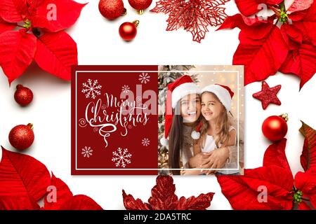 Beautiful Christmas greeting card with happy mother and little daughter Stock Photo