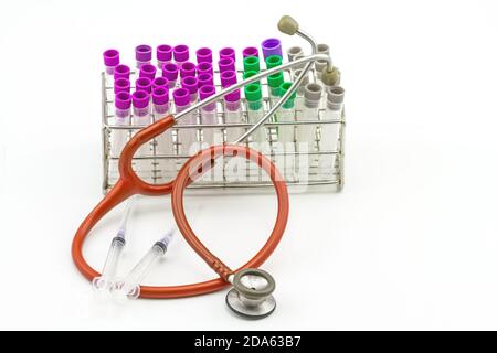 Stethoscope, syringe and test tube on white background Stock Photo - Alamy