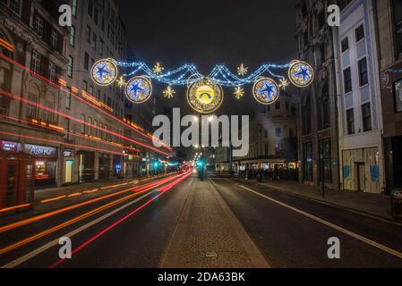 London, UK. 08th Nov, 2020. A long exposure view of traffic driving underneath the Christmas Lights on The Strand in London. Credit: SOPA Images Limited/Alamy Live News Stock Photo