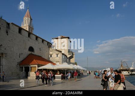 Tourists on the main promenade in the city of Trogir Stock Photo