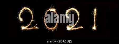 2021 written with sparkle firework, new year panoramic web banner Stock Photo