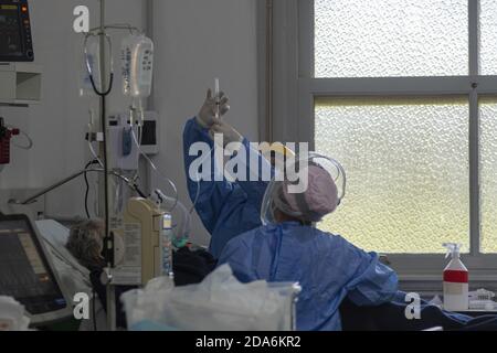 FIRMAT, ARGENTINA - Nov 08, 2020: Health workers inside a COVID-19 ICU in a countryside Hospital Stock Photo