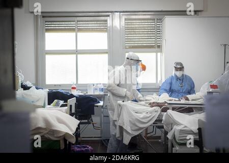 FIRMAT, ARGENTINA - Nov 08, 2020: Health workers inside a COVID-19 ICU in a countryside Hospital Stock Photo