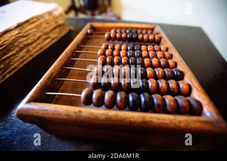 Old vintage wooden abacus, close up view Stock Photo