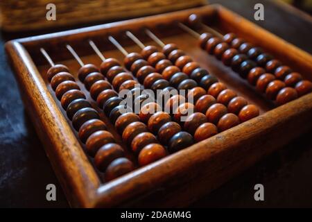 Old vintage wooden abacus, close up view Stock Photo