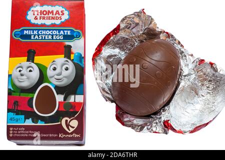 Kinnerton Thomas & Friends milk chocolate Easter Egg for Easter set on white background - Easter egg removed from box with foil unwrapped Stock Photo