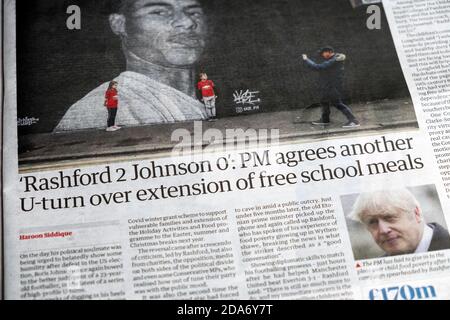 Marcus " 'Rashford 2 Johnson 0': PM agrees another U-turn over extension of free school meals" Guardian newspaper headline article  November 2020 UK Stock Photo