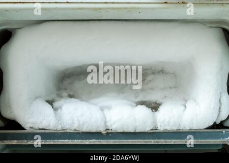 An Old Freezer Full Of Ice Stock Photo