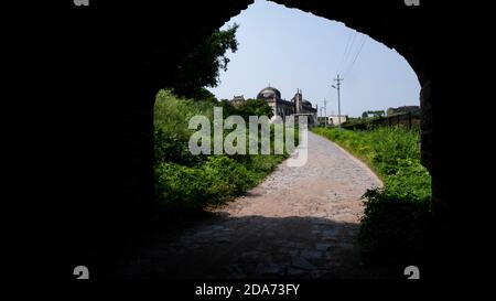 Jama Masjid isolated in silhouette arch, Kalaburagi, Karnatka/India-October 30.2020 Stock Photo