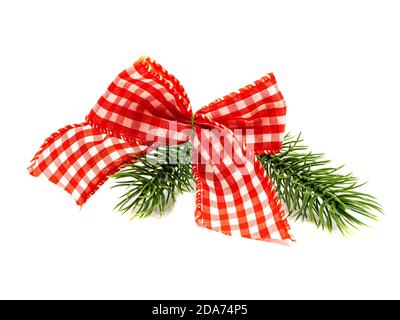 Red bow with fir branches isolated Stock Photo