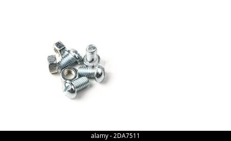 Screws and nuts on a white background. Stock Photo