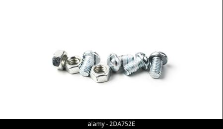 Nuts and screws on a white background. Stock Photo