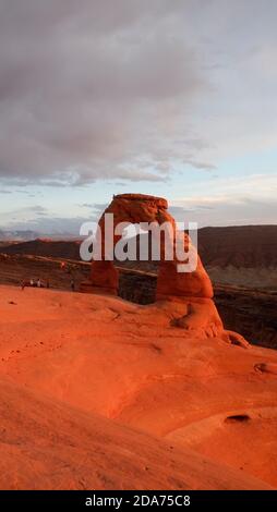 Delicate Arch is a 52-foot-tall (16 m) freestanding natural arch located in Arches National Park, near Moab in Grand County, Utah, United States. Stock Photo