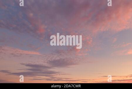 Beautiful multi colored violet pink orange colors sunset view. Full frame cloudy sky background. Evening or morning lights Stock Photo