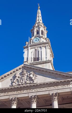 London, Westminster. Part of the frontage of the church of St Martin-in-the-Fields, showing the portico with the steeple behind. Stock Photo