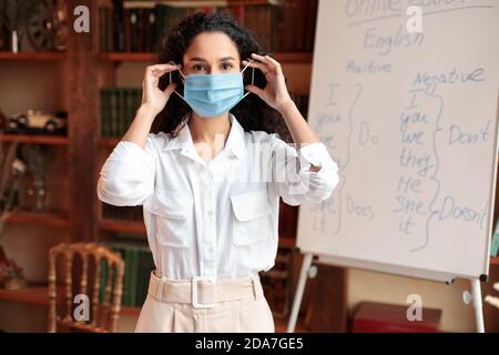 teacher in classroom wearing a medical mask school reopening Stock ...