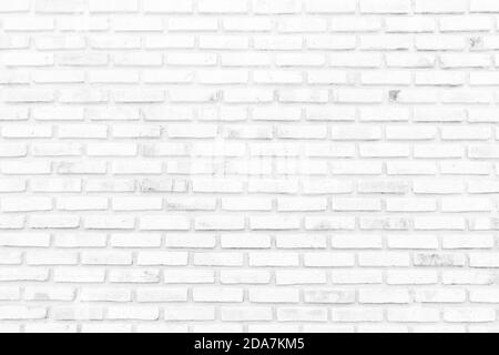 White brick walls that are not plastered background and texture. The texture of the brick is white. Background of empty white tile ceramic wall. Stock Photo