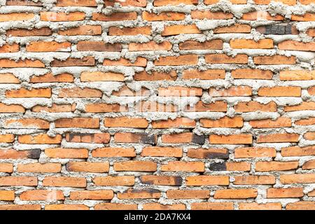 brick walls background and texture. The texture of the brick is orange. Background of empty brick basement wall. Stock Photo