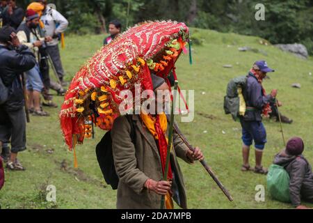 Chamoli, Uttarakhand, India, April 04 2014, An old man in religious yatra Nanda Devi Rat Jat in India. in Chamoli Nanda Devi Raj Jaat is organized once in 12 Years.  Stock Photo