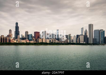 A peaceful morning at the lake front of Chicago. Skyline is looks more vibrant at the dawn and brings more tranquility in the atmosphere. Stock Photo