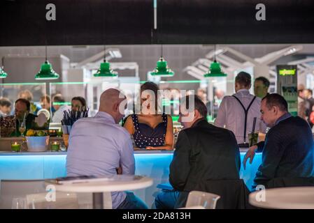 Colleagues having a drink attending the Amper event at the convention trade center in Brno. BVV Brno Exhibition center. Czech Republic Stock Photo