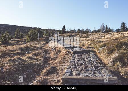 Steep mountain path upward, color toning applied. Stock Photo