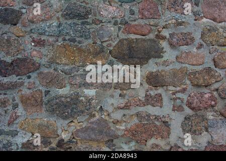 Castle wall made of old stones. Castle wall made of old stones textures for design and photo background. Stock Photo