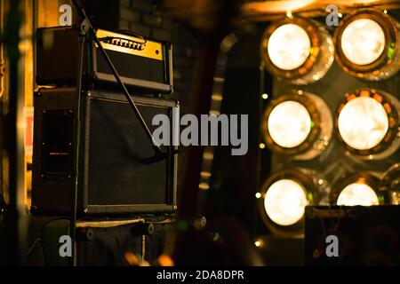 Electric guitar amplifier on club music stage Stock Photo