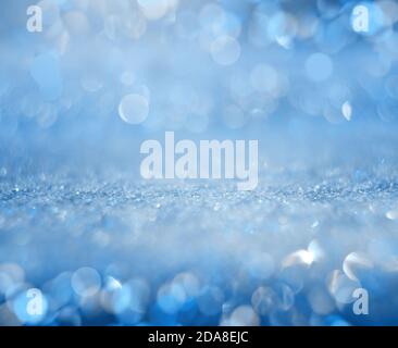 Glowing blurred blue background. Festive winter concept. Holiday. Stock Photo