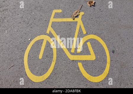 View of a bicycle path symbol drawn on a street in Bellinzona, Switzerland