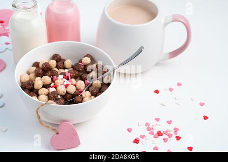 Cup with chocolate balls on a festive background. Stock Photo