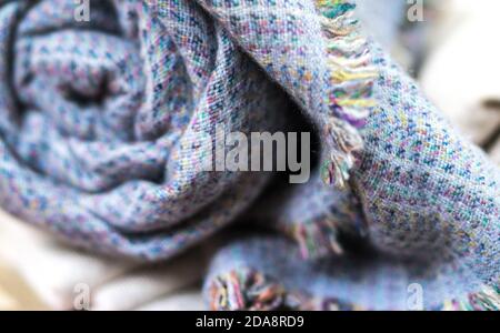 knitting cashmere wool yarn, closeup blue blanket, home decor, Blue tabby cashmere blanket rolled up Stock Photo