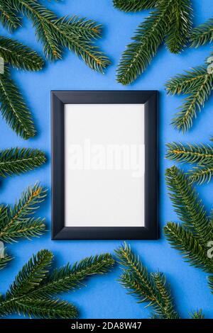 Christmas card mockup template with fir twigs and golden stars on a ...