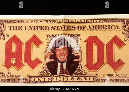 AC/DC rock band memorabilia from 1990 with Angus Young face on 1 US dollar fake banknote Stock Photo