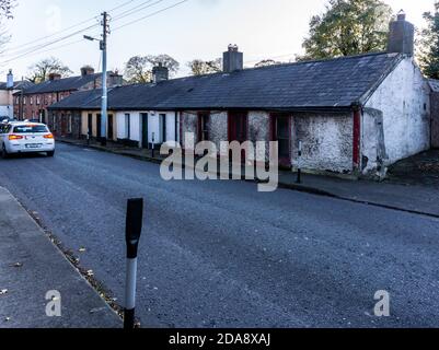 Chapelizod, Dublin,Ireland, Martins Row, Mainly occupied but one house clearly looking abandoned. Chapelizod, one of the original villages of Dublin. Stock Photo