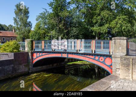 The colourful Bridge Street bridge over the Little Ouse River (1829), Thetford Riverside,Thetford, Norfolk, UK. Stock Photo