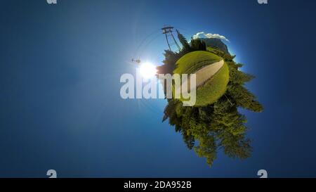 Small planet of a hiking trail in the Alps in sunny weather Stock Photo