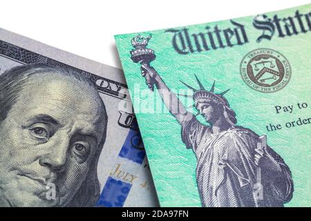 Federal Tax Return Check with Hundred Dollar Bill. Stock Photo
