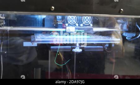 Automatic three dimensional 3D printer machine working at modern Stock Photo