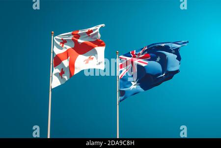 Beautiful national state flags of Georgia and Australia together at the sky background. 3D artwork concept. Stock Photo