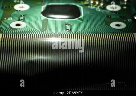 Electronic circuit board of an electronical calculator with many electrical components Stock Photo