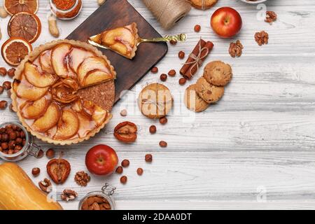 Top view of an apple pie on white wooden surface Stock Photo