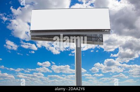 Big white billboard on the background of the sky close up Stock Photo