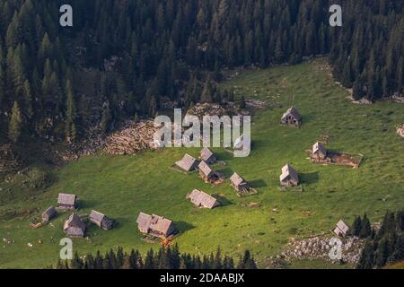 Mountain huts on mountain pasture Laz Stock Photo