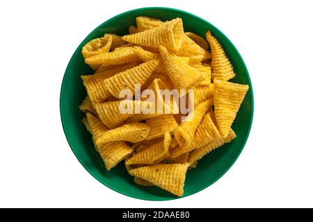 Walkers Bugles cheese flavour corn snack in colourful green bowl isolated on white background Stock Photo