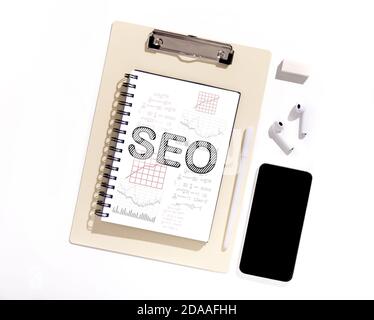 Search Engine Optimization Collage, Notebook With Keyword Seo On Desktop Stock Photo