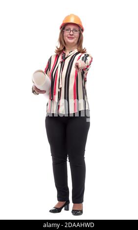 in full growth. smiling female architect pointing at you. Stock Photo