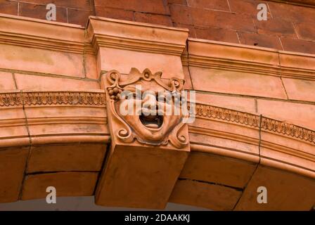 Victorian Terracotta Classic Mask in a Building Stock Photo