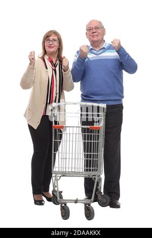 in full growth. casual elderly couple with shopping cart Stock Photo