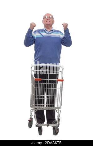 in full growth. casual elderly man with shopping cart Stock Photo